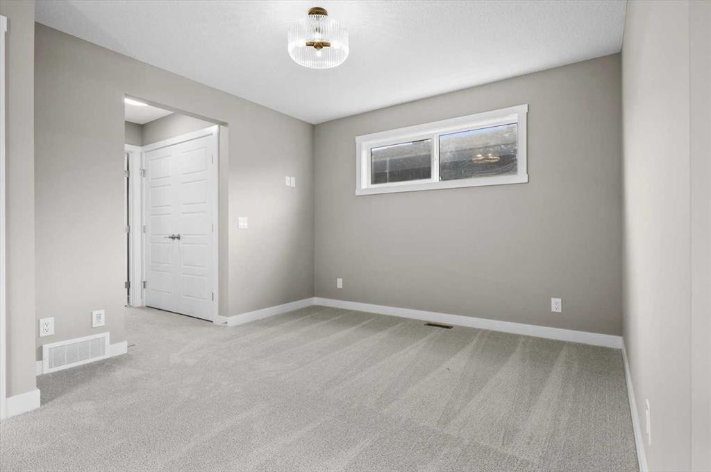 8 Topaz Place, Cochrane, AB - Indoor Photo Showing Other Room