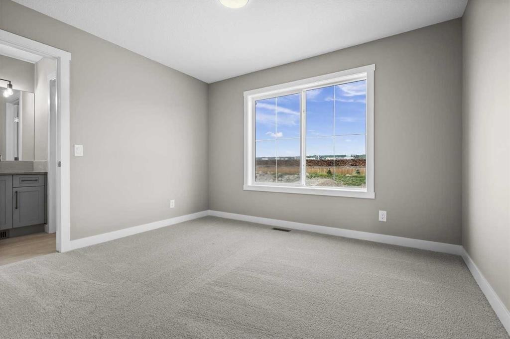 8 Topaz Place, Cochrane, AB - Indoor Photo Showing Other Room