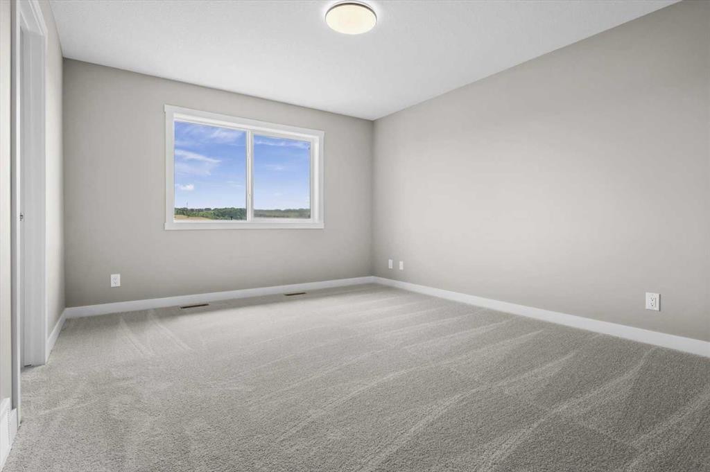 8 Topaz Place, Cochrane, AB - Indoor Photo Showing Other Room