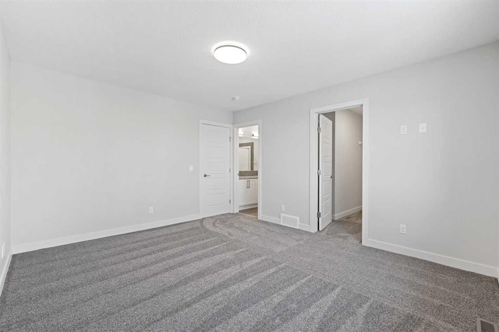 8 Topaz Place, Cochrane, AB - Indoor Photo Showing Other Room