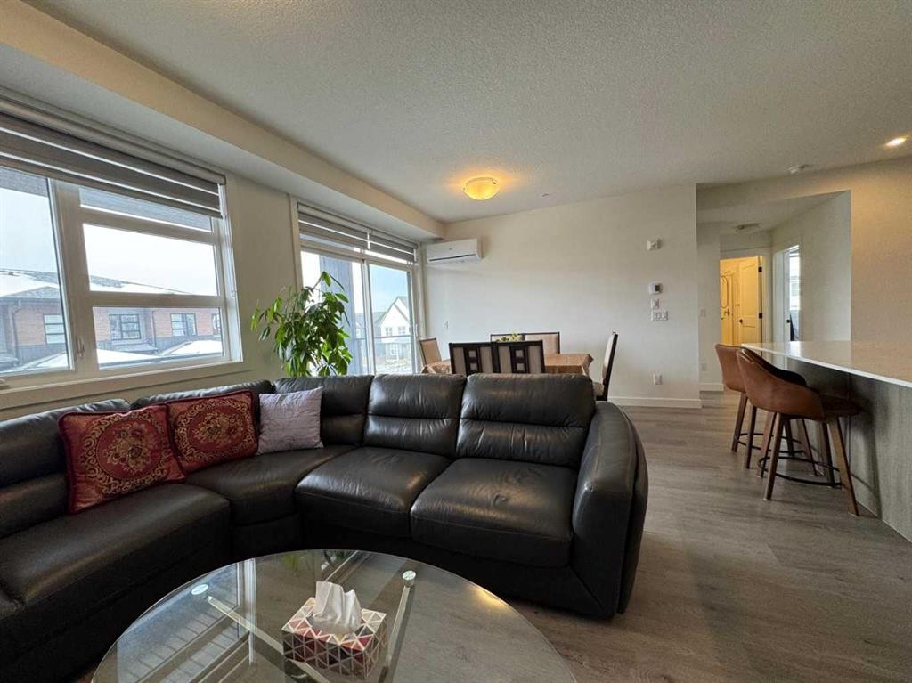 1207-55 Lucas Way Nw, Calgary, AB - Indoor Photo Showing Living Room