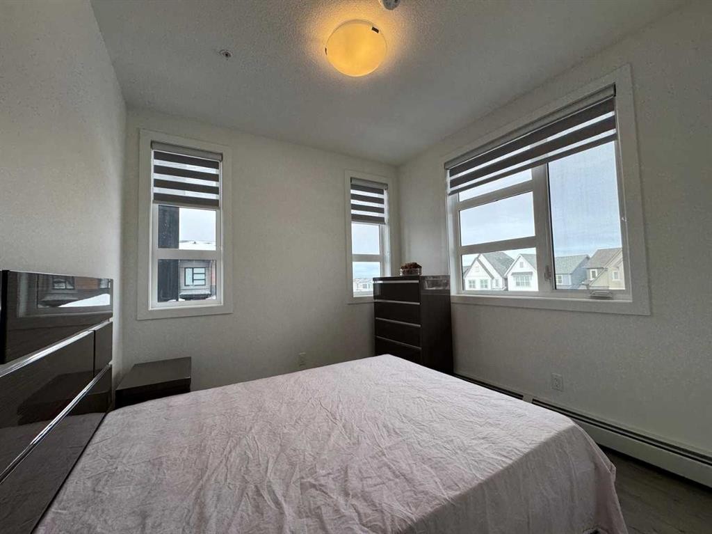 1207-55 Lucas Way Nw, Calgary, AB - Indoor Photo Showing Bedroom