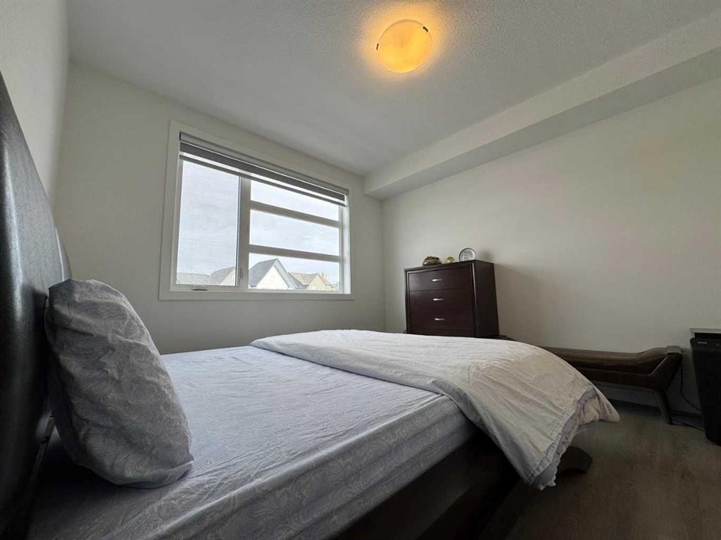 1207-55 Lucas Way Nw, Calgary, AB - Indoor Photo Showing Bedroom