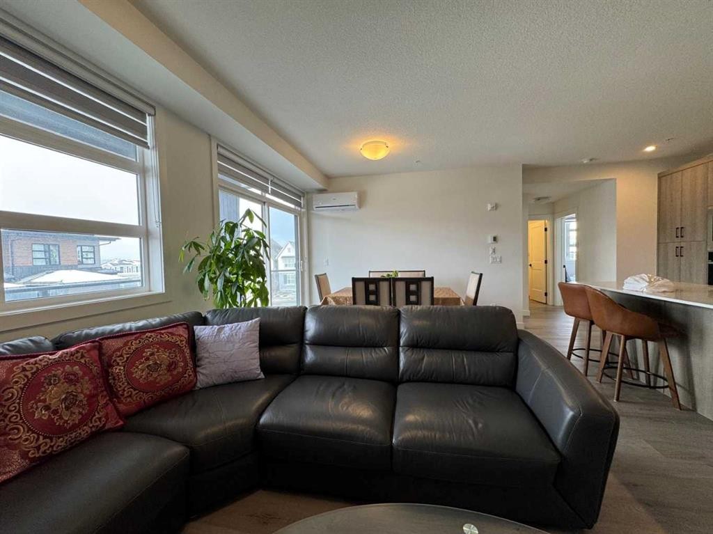1207-55 Lucas Way Nw, Calgary, AB - Indoor Photo Showing Living Room