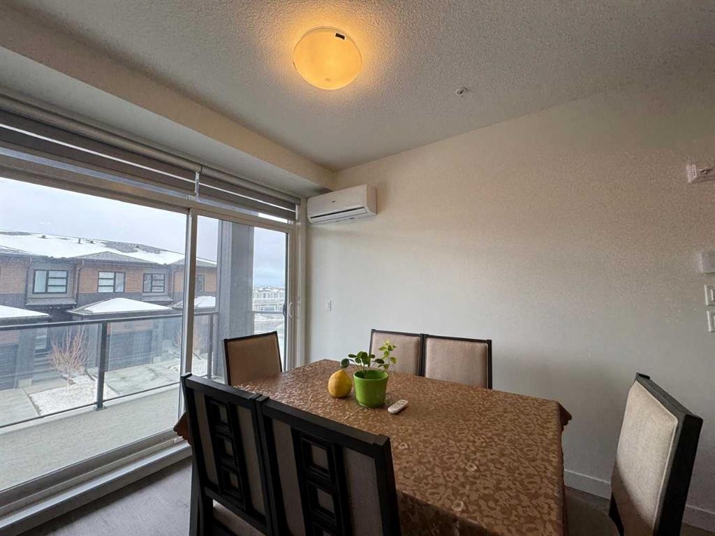 1207-55 Lucas Way Nw, Calgary, AB - Indoor Photo Showing Dining Room
