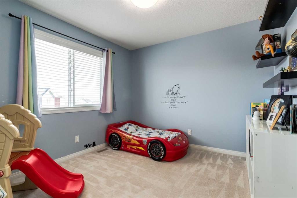 26 Mount Rae Terrace, Okotoks, AB - Indoor Photo Showing Bedroom