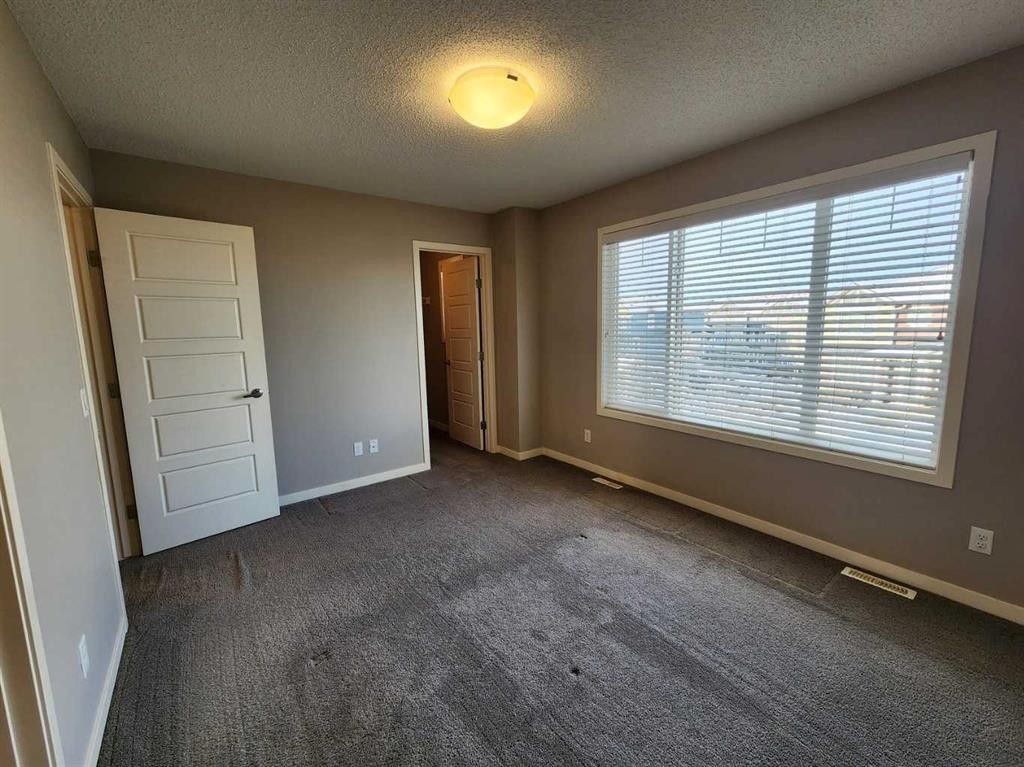 217 Panatella Walk Nw, Calgary, AB - Indoor Photo Showing Other Room