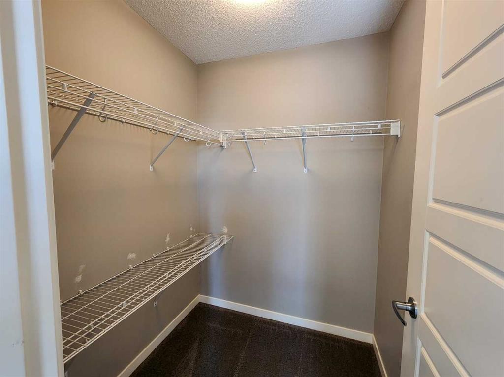 217 Panatella Walk Nw, Calgary, AB - Indoor With Storage