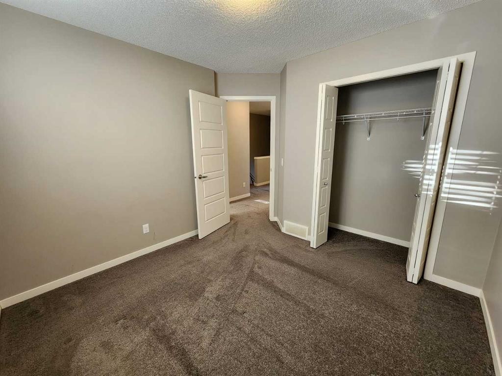 217 Panatella Walk Nw, Calgary, AB - Indoor Photo Showing Other Room