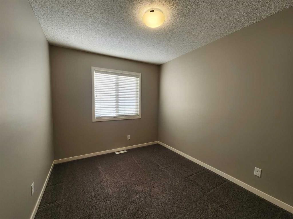 217 Panatella Walk Nw, Calgary, AB - Indoor Photo Showing Other Room