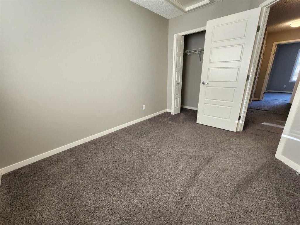 217 Panatella Walk Nw, Calgary, AB - Indoor Photo Showing Other Room