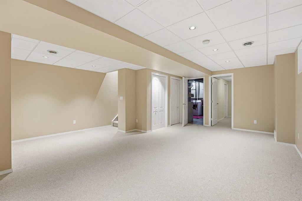 905 Arbour Lake Road Nw, Calgary, AB - Indoor Photo Showing Other Room