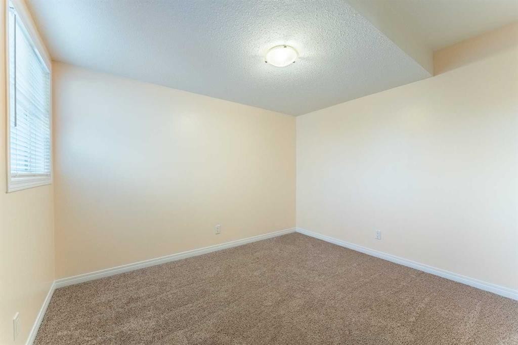 224 Highland Circle, Strathmore, AB - Indoor Photo Showing Other Room