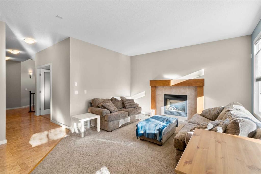 5 Mahogany Square Se, Calgary, AB - Indoor Photo Showing Living Room With Fireplace