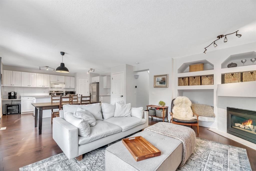 249 Mt.Douglas Circle Se, Calgary, AB - Indoor Photo Showing Living Room With Fireplace