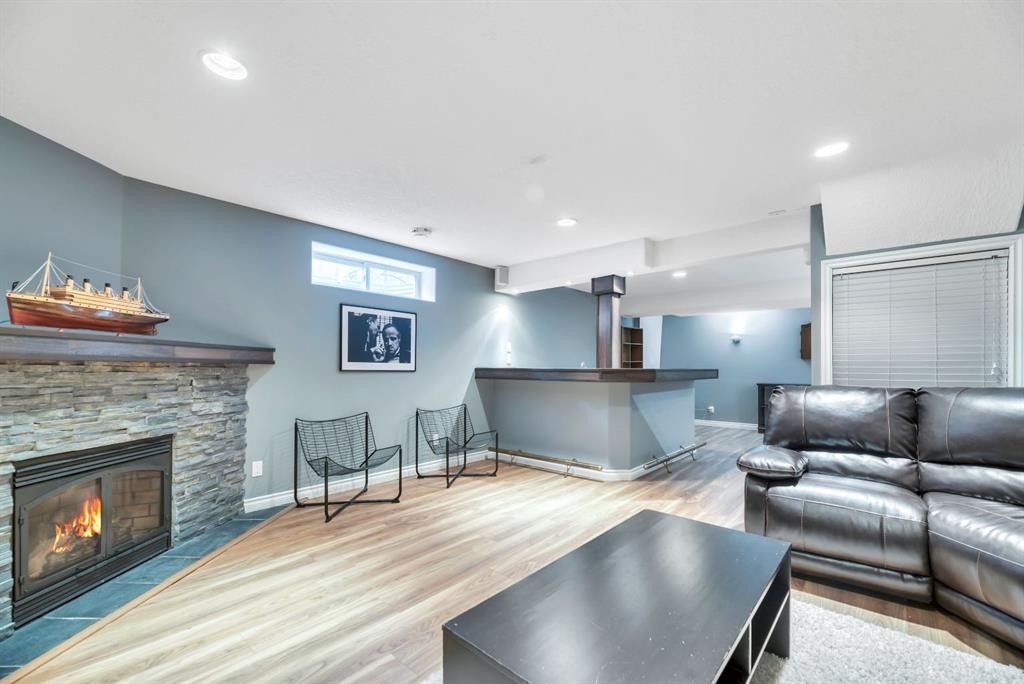 249 Mt.Douglas Circle Se, Calgary, AB - Indoor Photo Showing Living Room With Fireplace