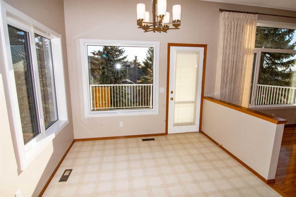 16 Eagleview Heights Nw, Cochrane, AB - Indoor Photo Showing Other Room