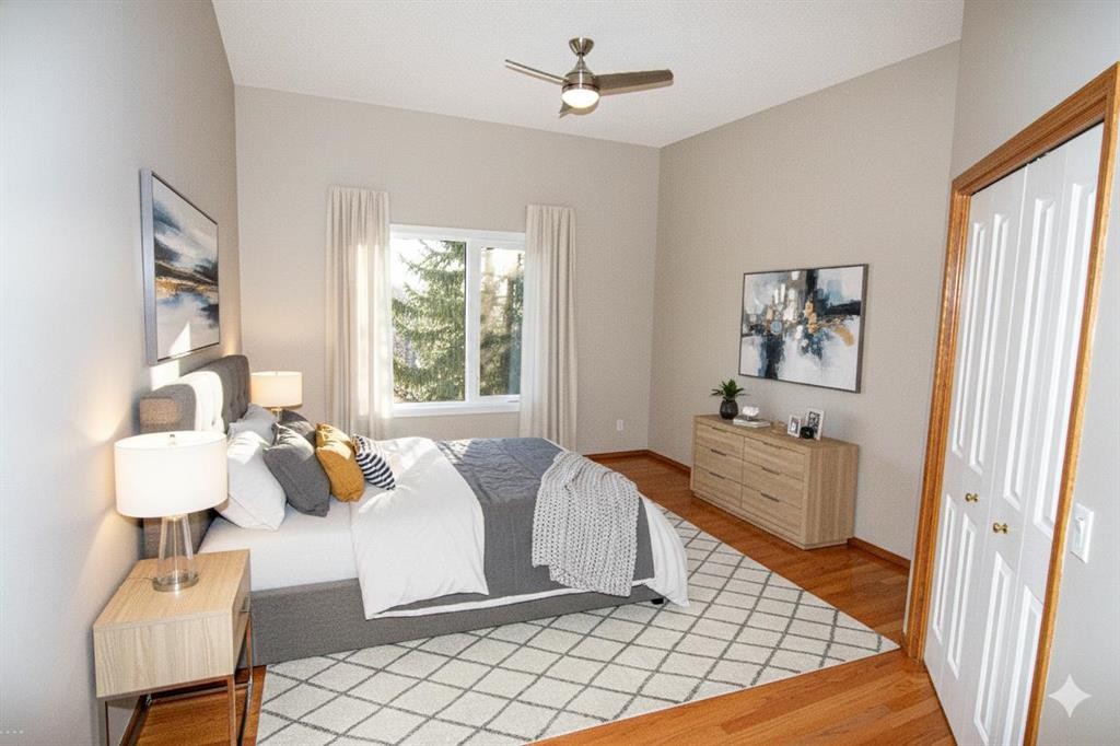 16 Eagleview Heights Nw, Cochrane, AB - Indoor Photo Showing Bedroom