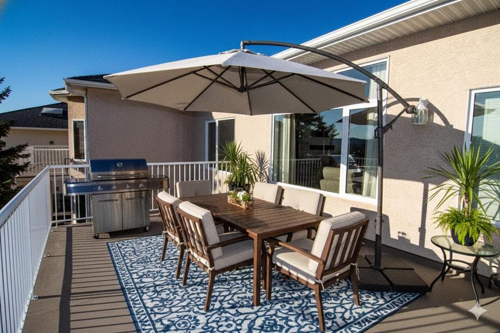 16 Eagleview Heights Nw, Cochrane, AB - Outdoor With Deck Patio Veranda With Exterior