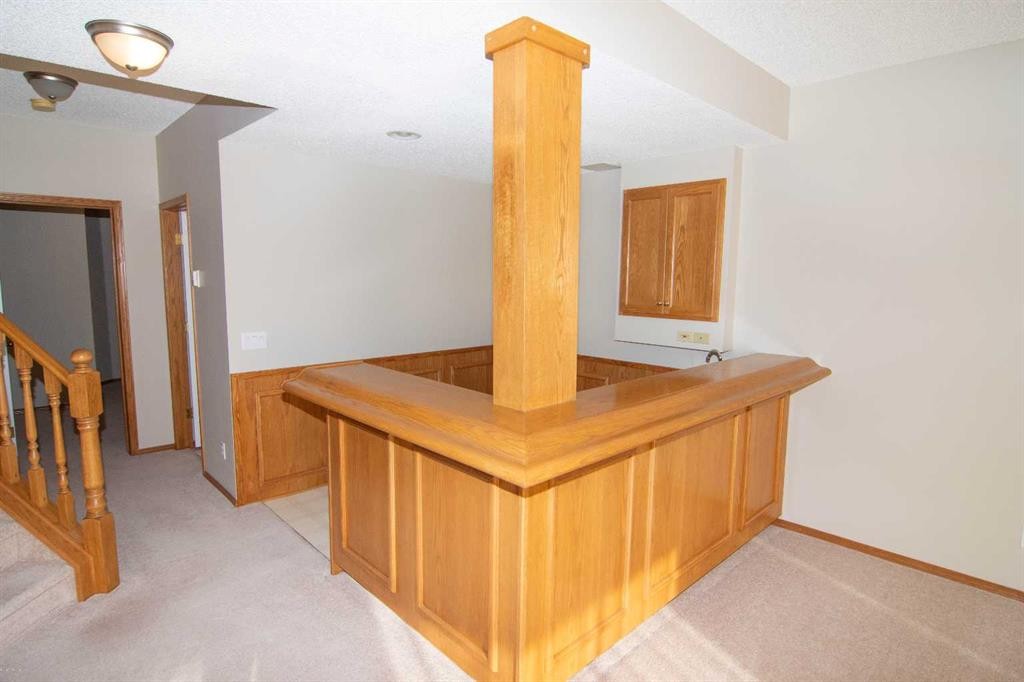 16 Eagleview Heights Nw, Cochrane, AB - Indoor Photo Showing Other Room