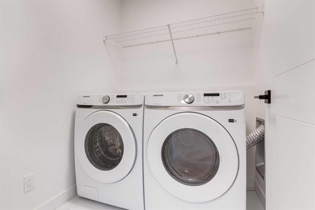 203 Tillotson Drive, Okotoks, AB - Indoor Photo Showing Laundry Room
