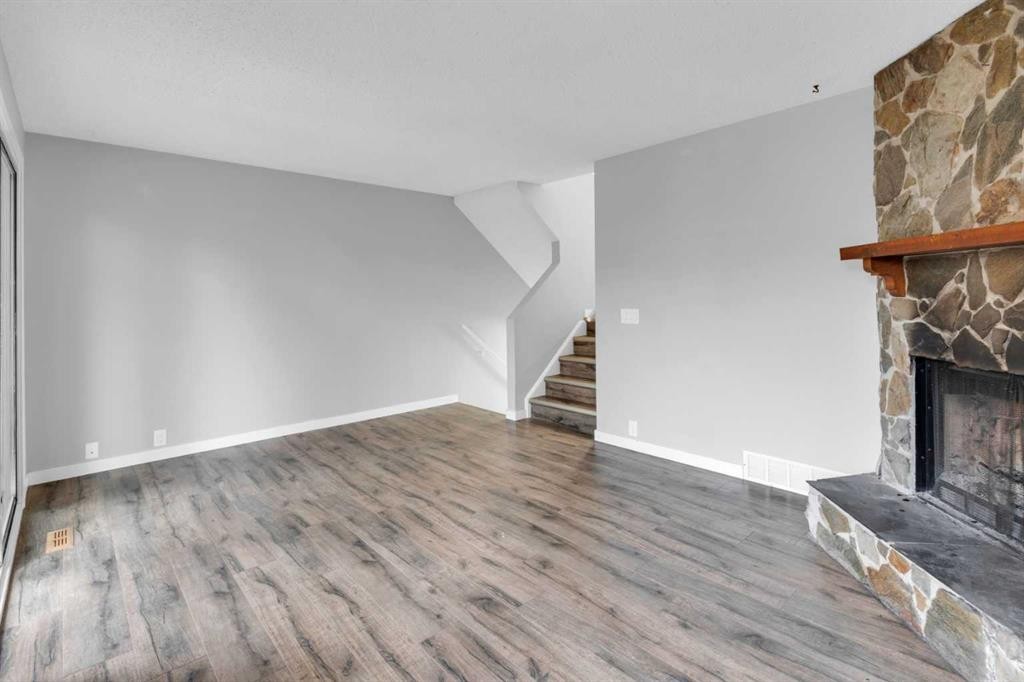 1418 Ranchlands Road Nw, Calgary, AB - Indoor With Fireplace