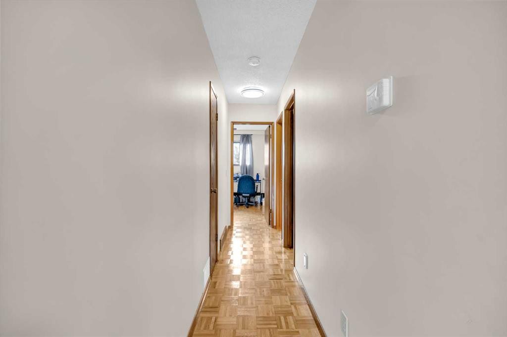 49 Beacham Way Nw, Calgary, AB - Indoor Photo Showing Other Room