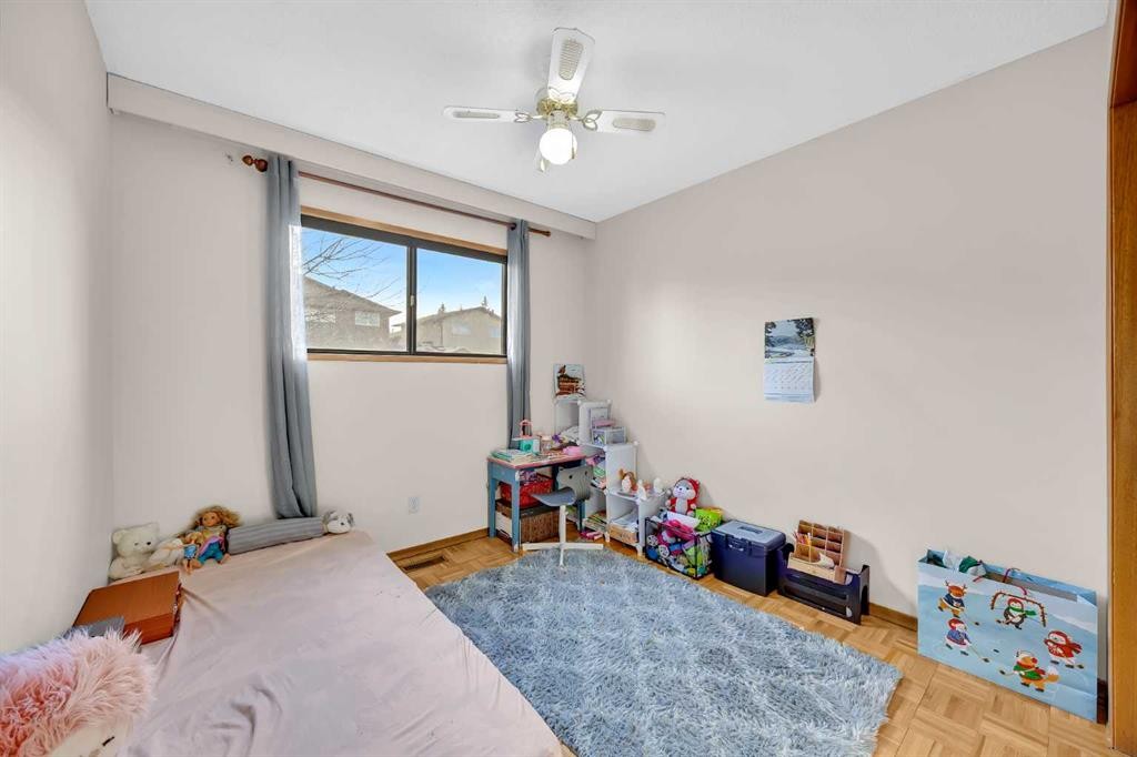 49 Beacham Way Nw, Calgary, AB - Indoor Photo Showing Bedroom