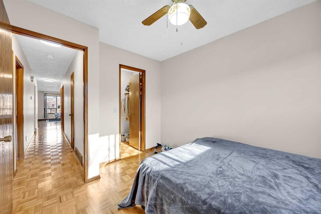 49 Beacham Way Nw, Calgary, AB - Indoor Photo Showing Bedroom