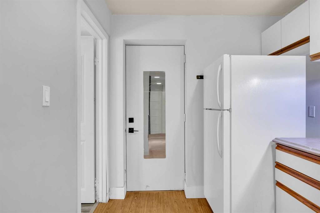 49 Beacham Way Nw, Calgary, AB - Indoor Photo Showing Other Room