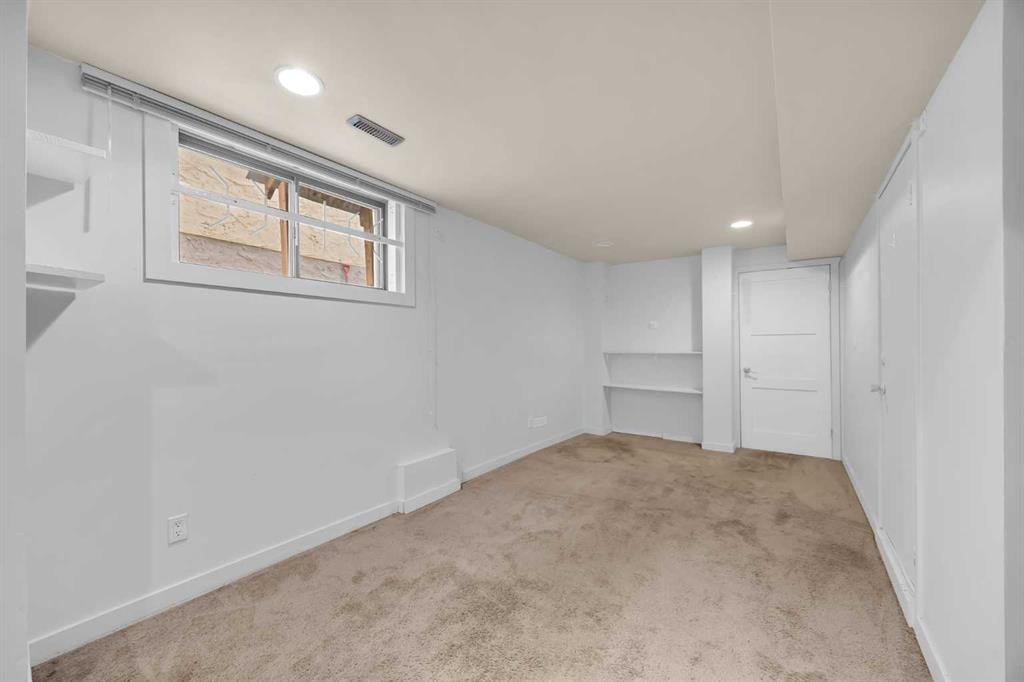 49 Beacham Way Nw, Calgary, AB - Indoor Photo Showing Other Room