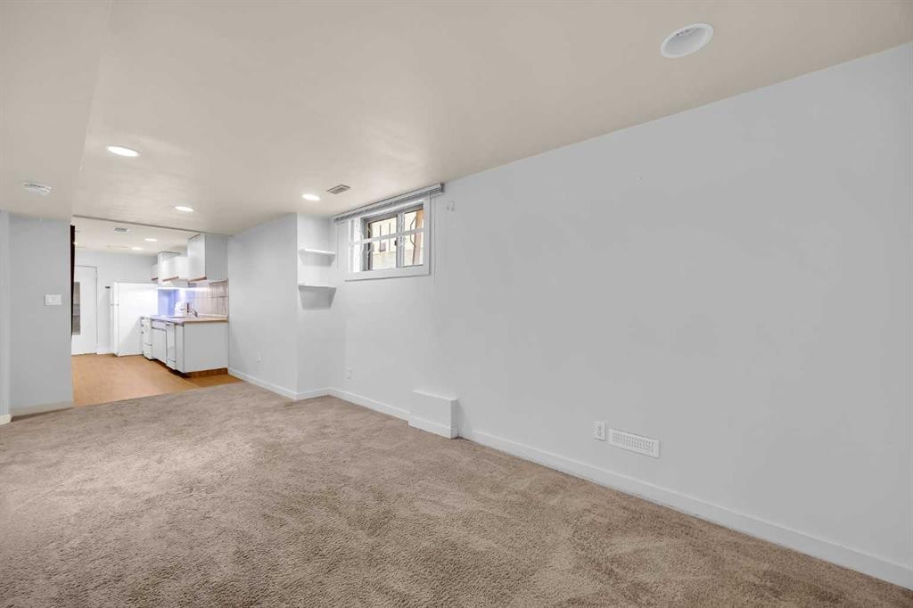 49 Beacham Way Nw, Calgary, AB - Indoor Photo Showing Other Room