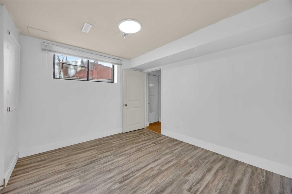 49 Beacham Way Nw, Calgary, AB - Indoor Photo Showing Other Room