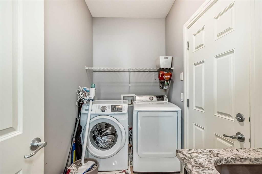 26 Saddlelake View Ne, Calgary, AB - Indoor Photo Showing Laundry Room