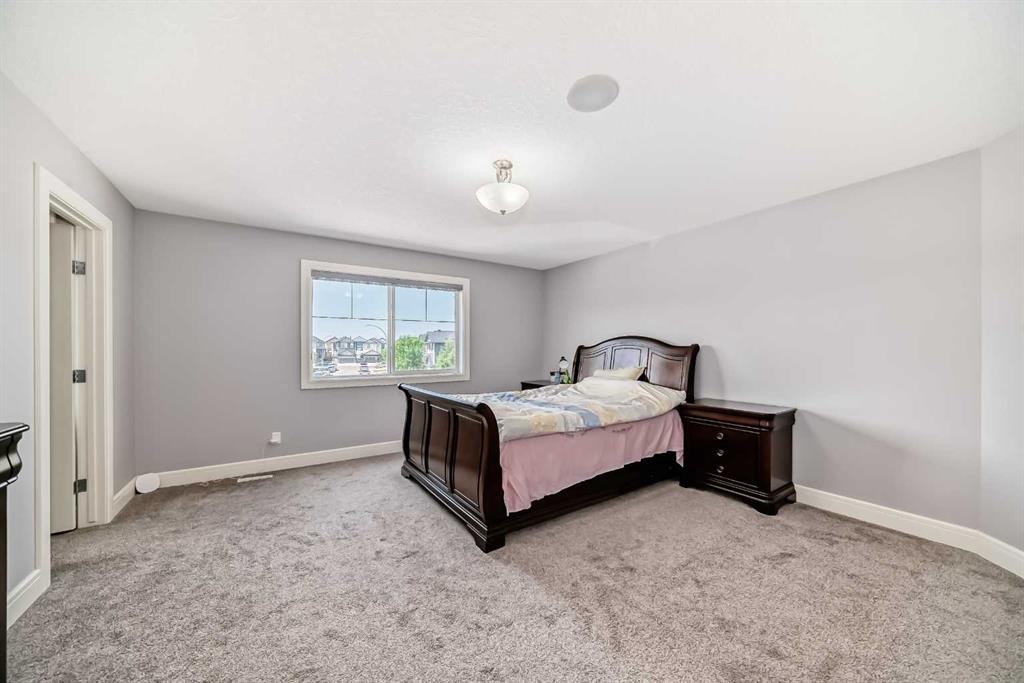 26 Saddlelake View Ne, Calgary, AB - Indoor Photo Showing Bedroom