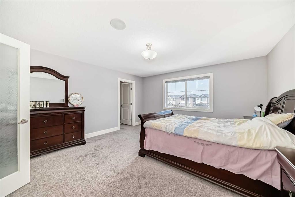 26 Saddlelake View Ne, Calgary, AB - Indoor Photo Showing Bedroom