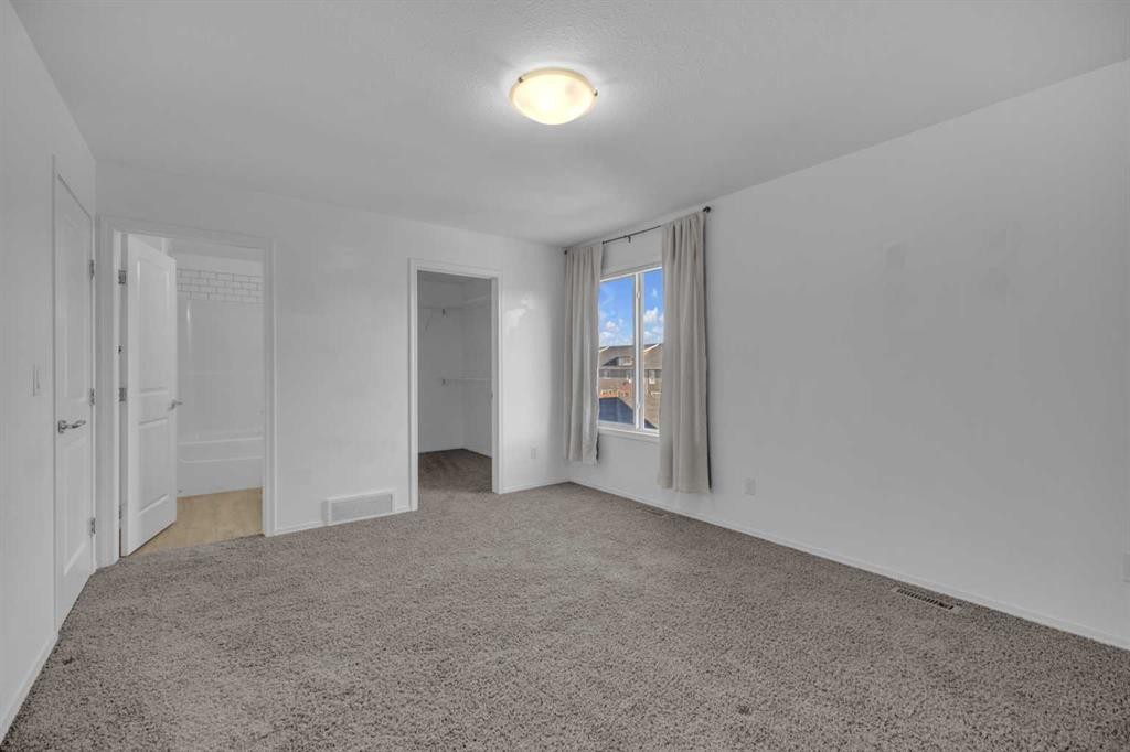 85 Reynolds Road, Sylvan Lake, AB - Indoor Photo Showing Other Room