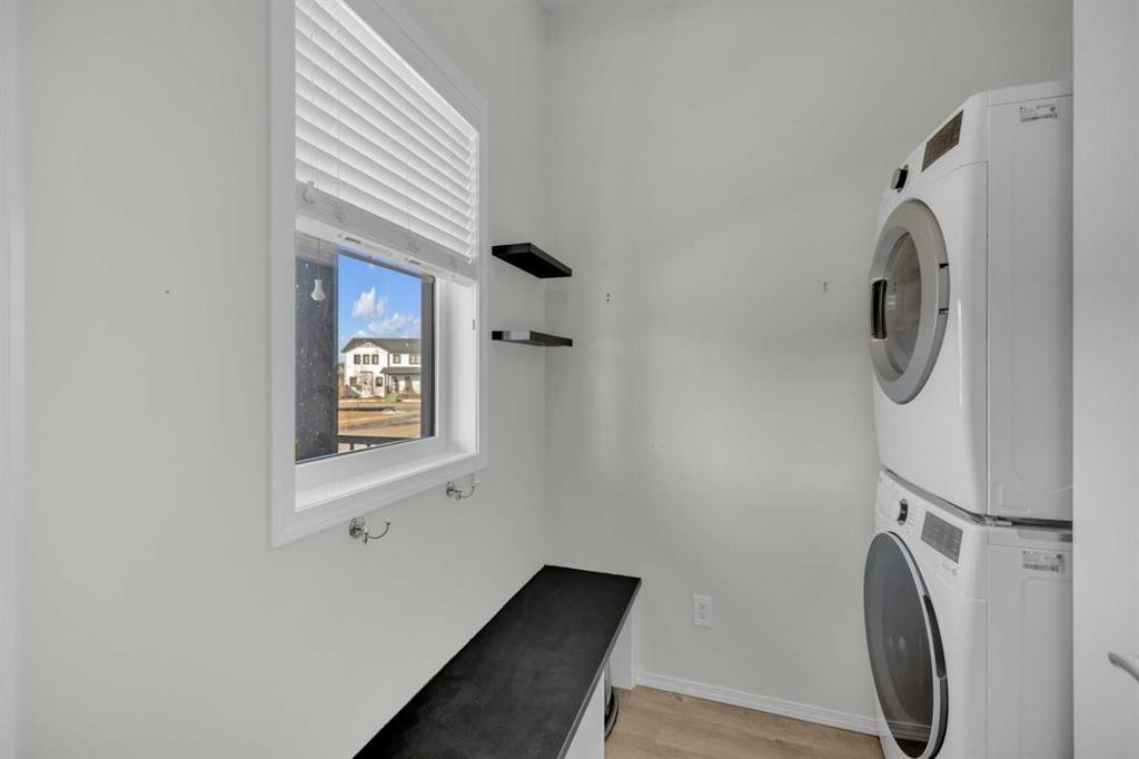85 Reynolds Road, Sylvan Lake, AB - Indoor Photo Showing Laundry Room