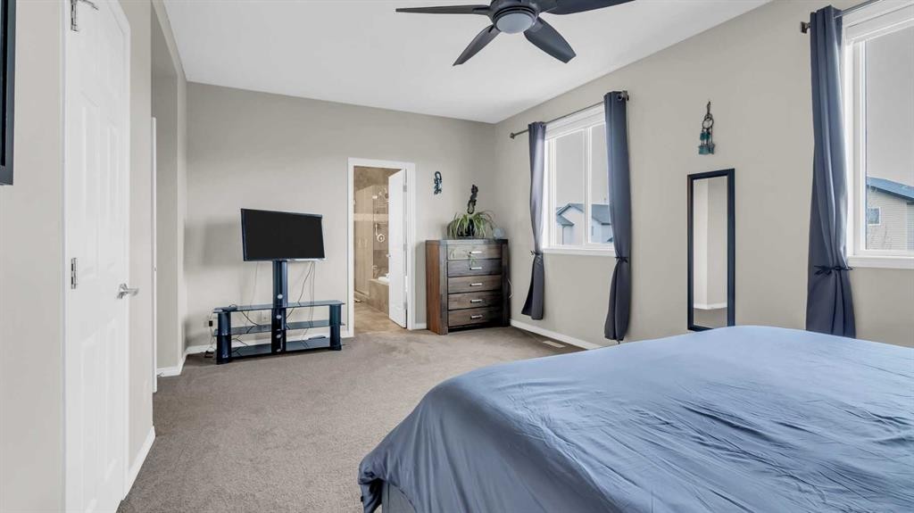 1120 Windhaven Close Sw, Airdrie, AB - Indoor Photo Showing Bedroom