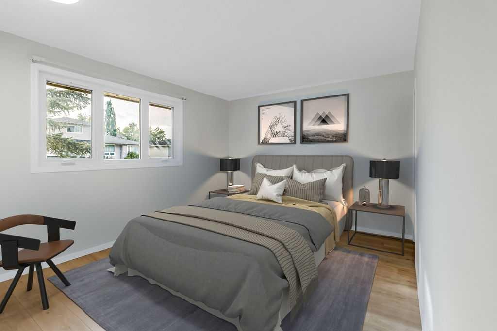 10 Radcliffe Crescent Se, Calgary, AB - Indoor Photo Showing Bedroom