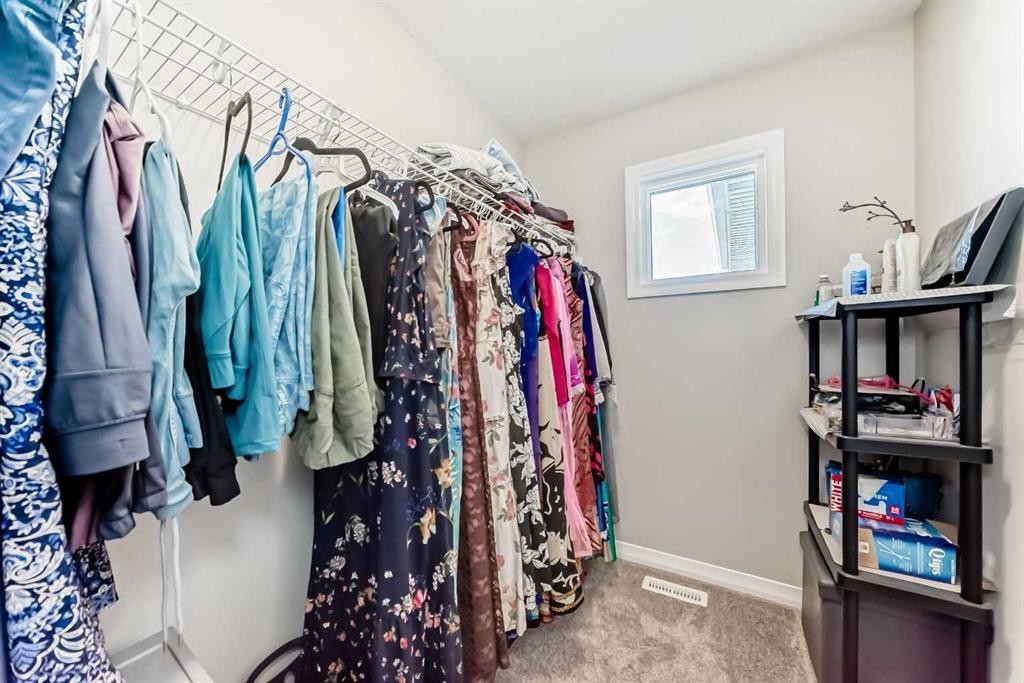 615 Kingsmere Way Se, Airdrie, AB - Indoor With Storage