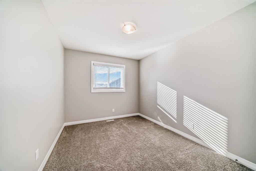 615 Kingsmere Way Se, Airdrie, AB - Indoor Photo Showing Other Room