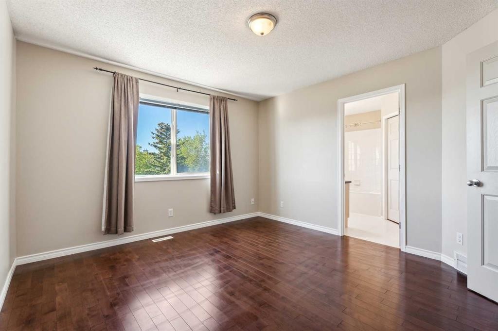 73 Rocky Ridge Heath Nw, Calgary, AB - Indoor Photo Showing Other Room