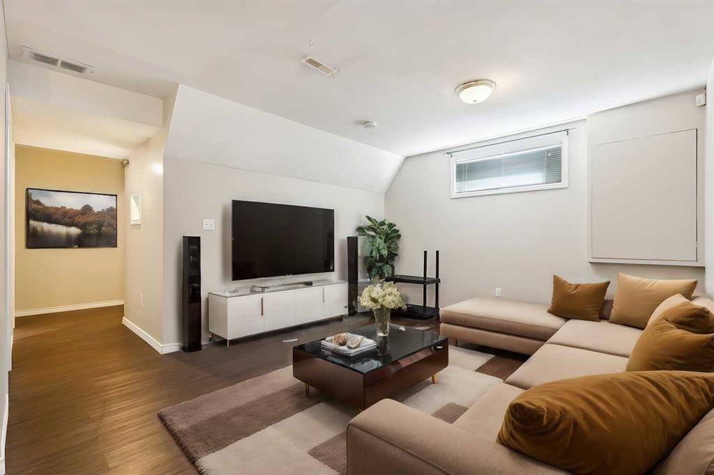 73 Rocky Ridge Heath Nw, Calgary, AB - Indoor Photo Showing Living Room