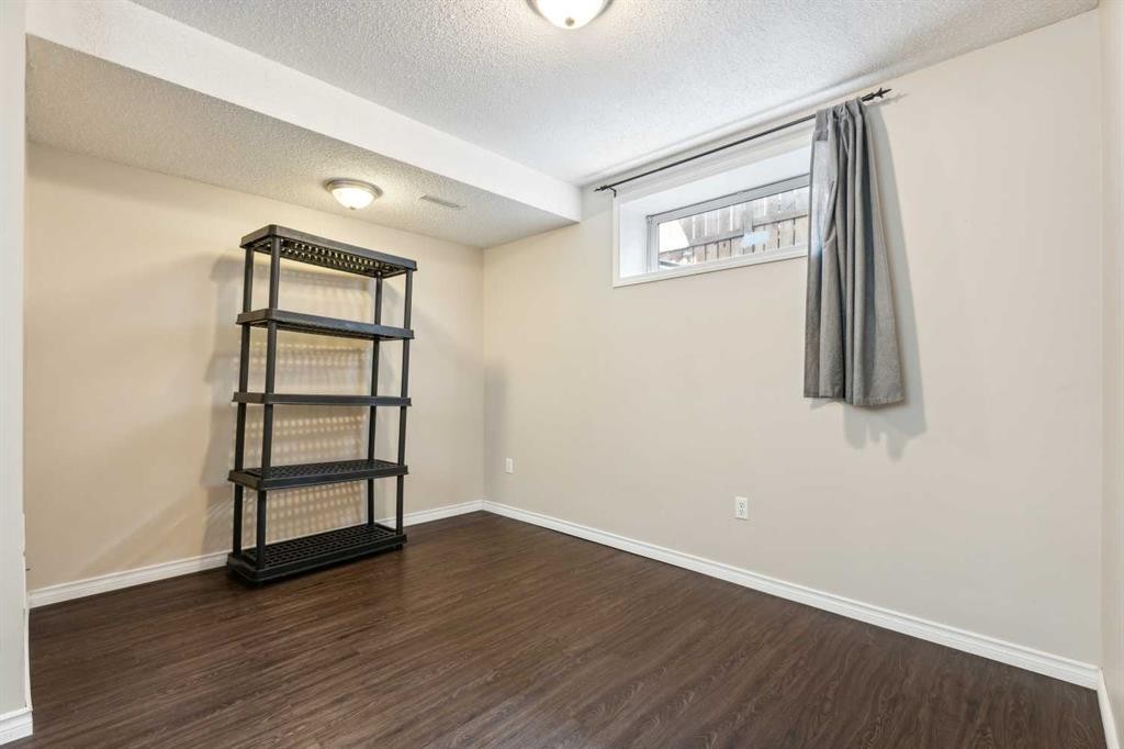 73 Rocky Ridge Heath Nw, Calgary, AB - Indoor Photo Showing Other Room