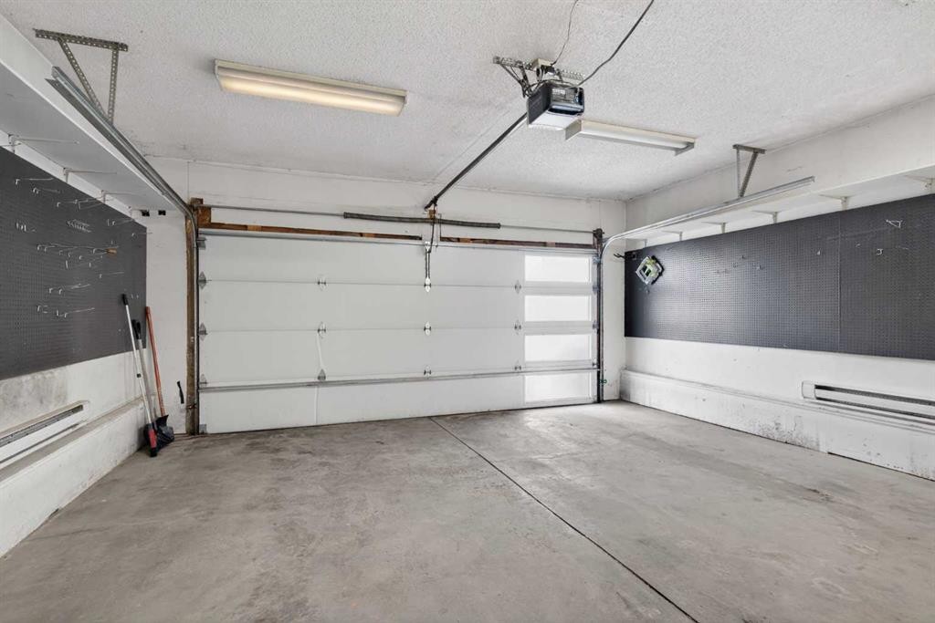 328 Douglas Ridge Close Se, Calgary, AB - Indoor Photo Showing Garage