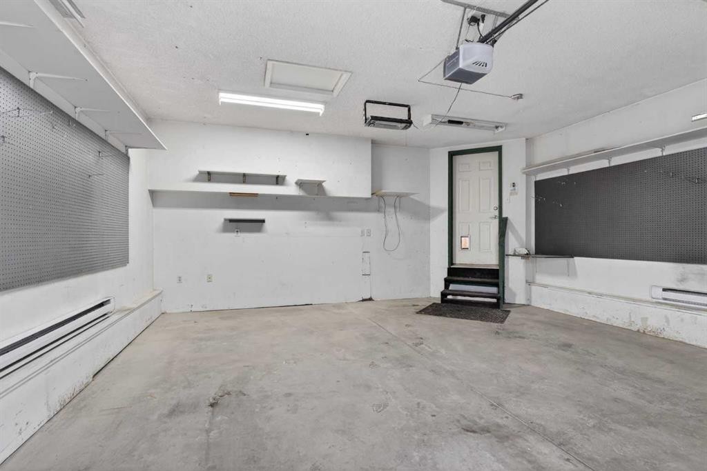 328 Douglas Ridge Close Se, Calgary, AB - Indoor Photo Showing Garage