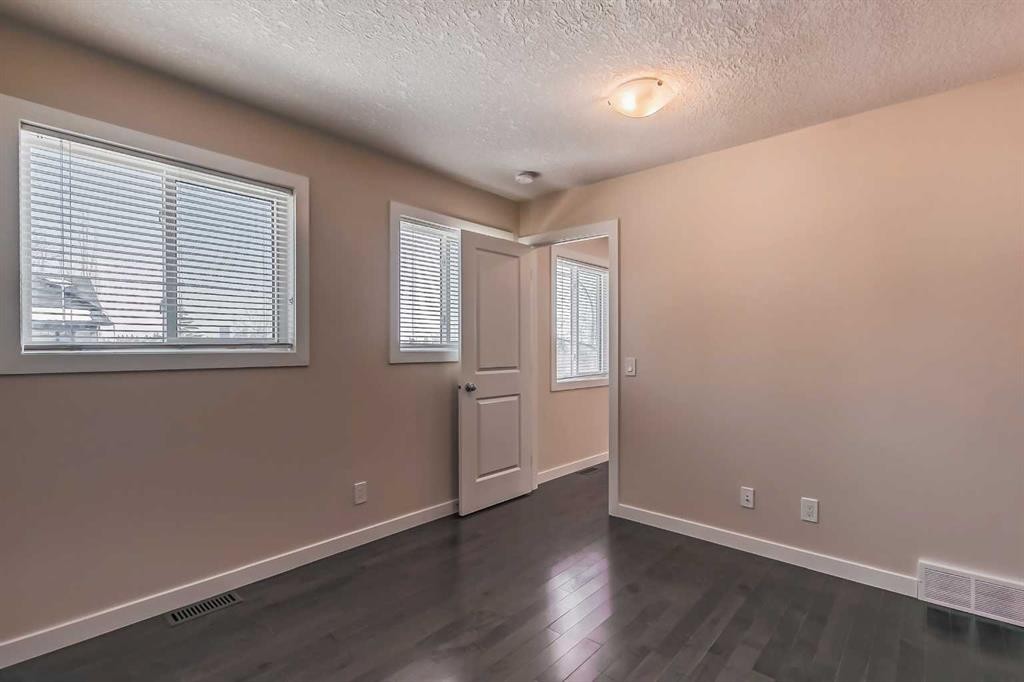 23 Cheltenham Road Nw, Calgary, AB - Indoor Photo Showing Other Room