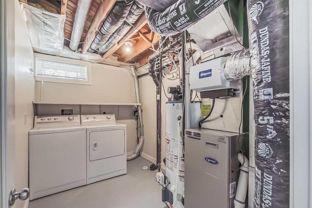 23 Cheltenham Road Nw, Calgary, AB - Indoor Photo Showing Laundry Room