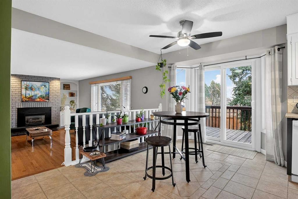 1480 Berkley Drive Nw, Calgary, AB - Indoor Photo Showing Other Room With Fireplace